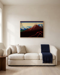 Thunderstorm Beneath the Summit by Katsushika Hokusai framed in natural oak above a cream sofa in a warm living room