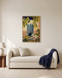 Yōrō Waterfall by Katsushika Hokusai framed in natural oak above a cream sofa in a warm living room