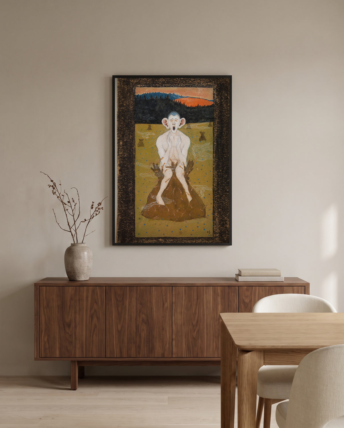 Frost by Hugo Simberg in a black frame above a walnut sideboard in a dining room
