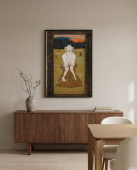 Frost by Hugo Simberg in a black frame above a walnut sideboard in a dining room