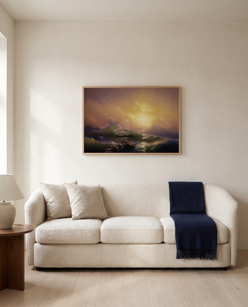 The Ninth Wave by Ivan Aivazovsky framed in natural oak above a cream sofa in a warm living room