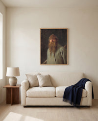 Forester by Ivan Kramskoi framed in natural oak above a cream sofa in a warm living room