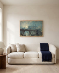 Alnwick Castle by J. M. W. Turner framed in natural oak above a cream sofa in a warm living room