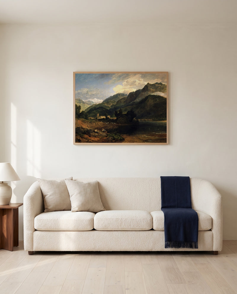 Bonneville, Savoy by J. M. W. Turner framed in natural oak above a cream sofa in a warm living room