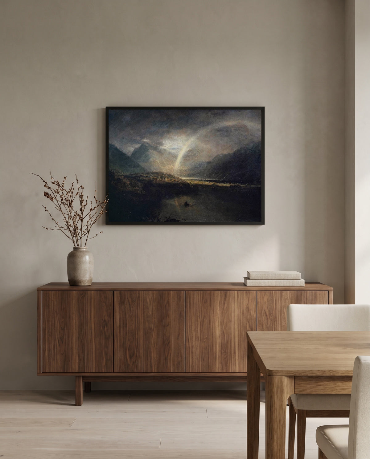 Buttermere Lake by J. M. W. Turner in a black frame above a walnut sideboard in a dining room
