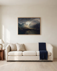 Buttermere Lake by J. M. W. Turner framed in natural oak above a cream sofa in a warm living room