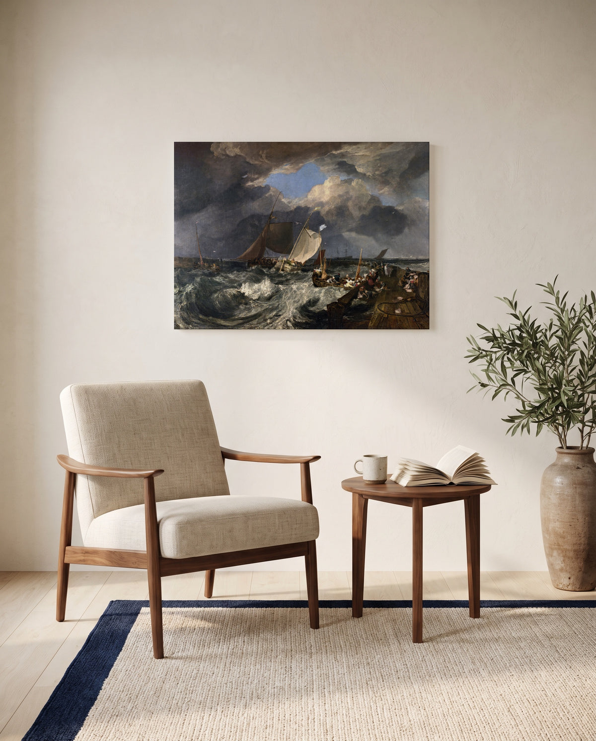 Calais Pier by J. M. W. Turner as a stretched canvas above a linen lounge chair in a reading corner