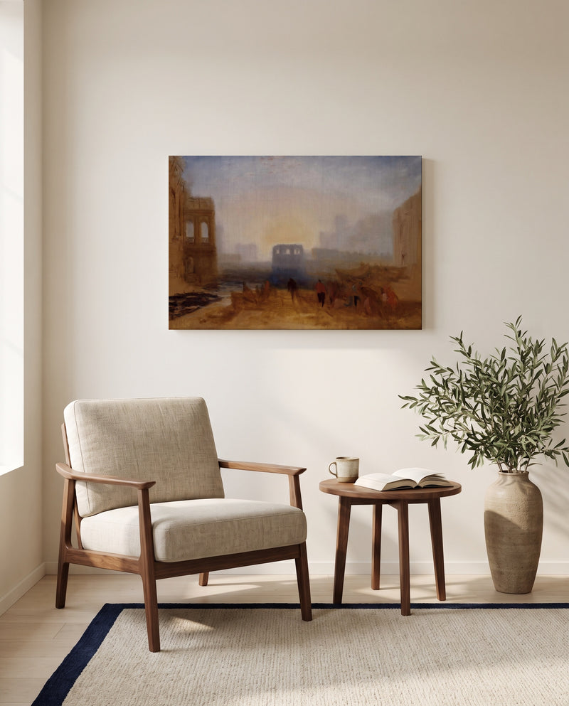 Claudian Harbour Scene by J. M. W. Turner as a stretched canvas above a linen lounge chair in a reading corner