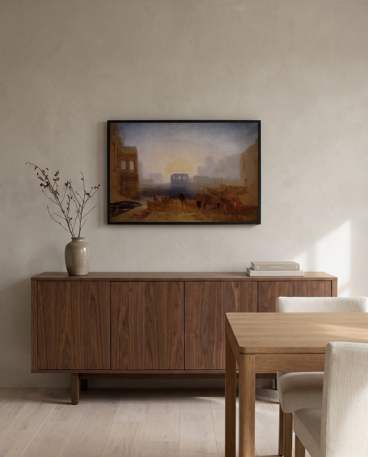 Claudian Harbour Scene by J. M. W. Turner in a black frame above a walnut sideboard in a dining room