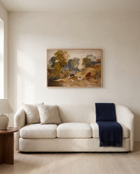 Cows with a Footbridge by J. M. W. Turner framed in natural oak above a cream sofa in a warm living room