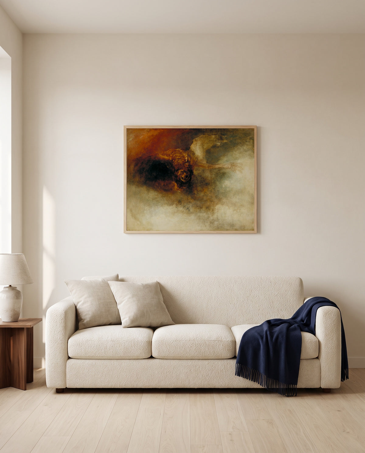 Death on a Pale Horse by J. M. W. Turner framed in natural oak above a cream sofa in a warm living room
