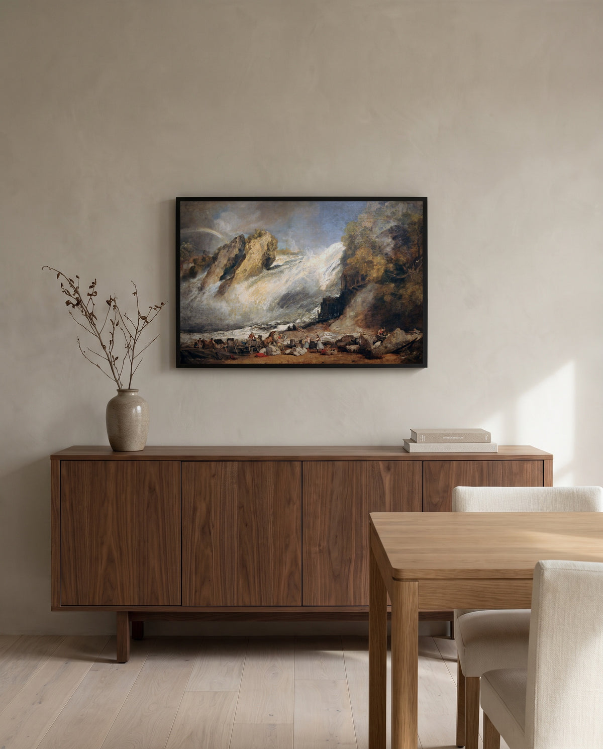 Fall of the Rhine by J. M. W. Turner in a black frame above a walnut sideboard in a dining room