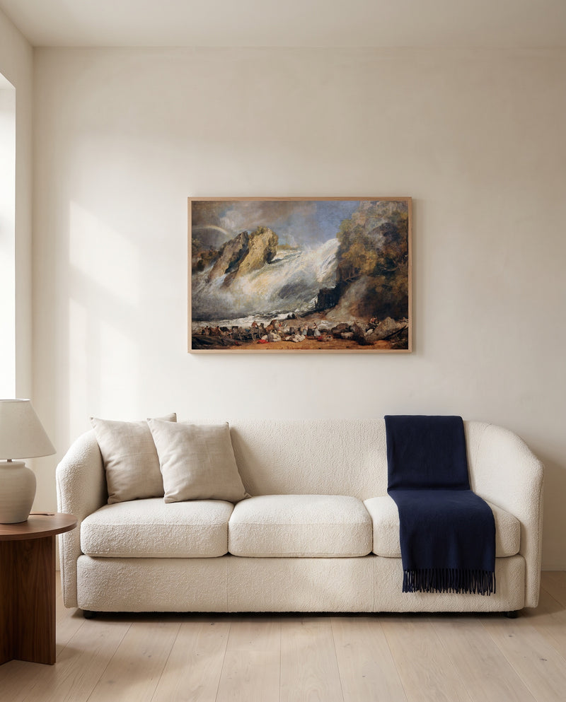 Fall of the Rhine by J. M. W. Turner framed in natural oak above a cream sofa in a warm living room