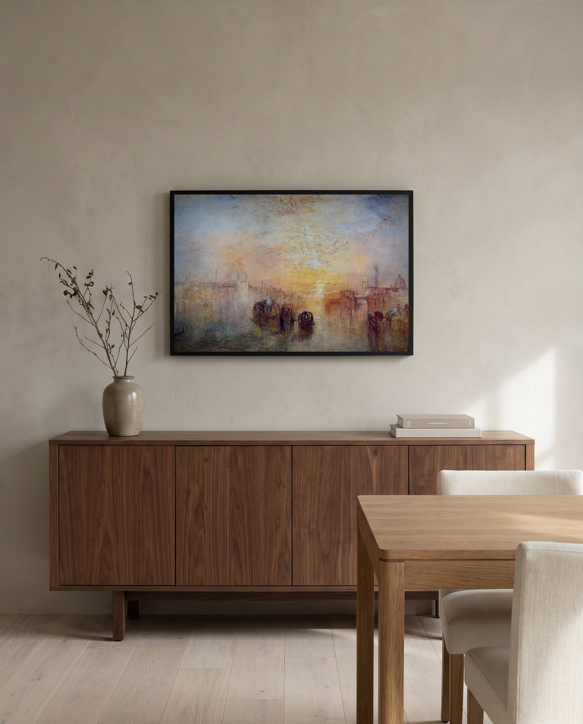 Going to the Ball by J. M. W. Turner in a black frame above a walnut sideboard in a dining room