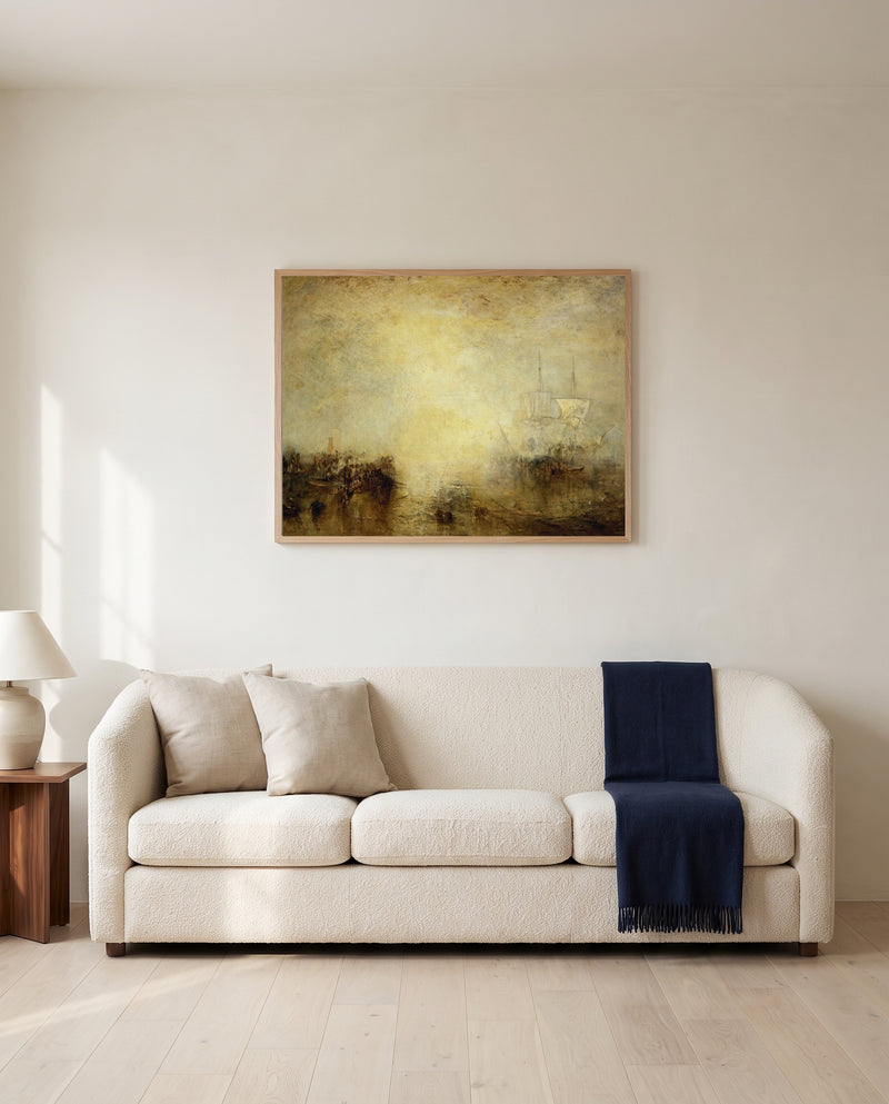 Hurrah for the Erebus! by J. M. W. Turner framed in natural oak above a cream sofa in a warm living room