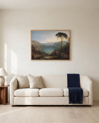 Lake Avernus by J. M. W. Turner framed in natural oak above a cream sofa in a warm living room
