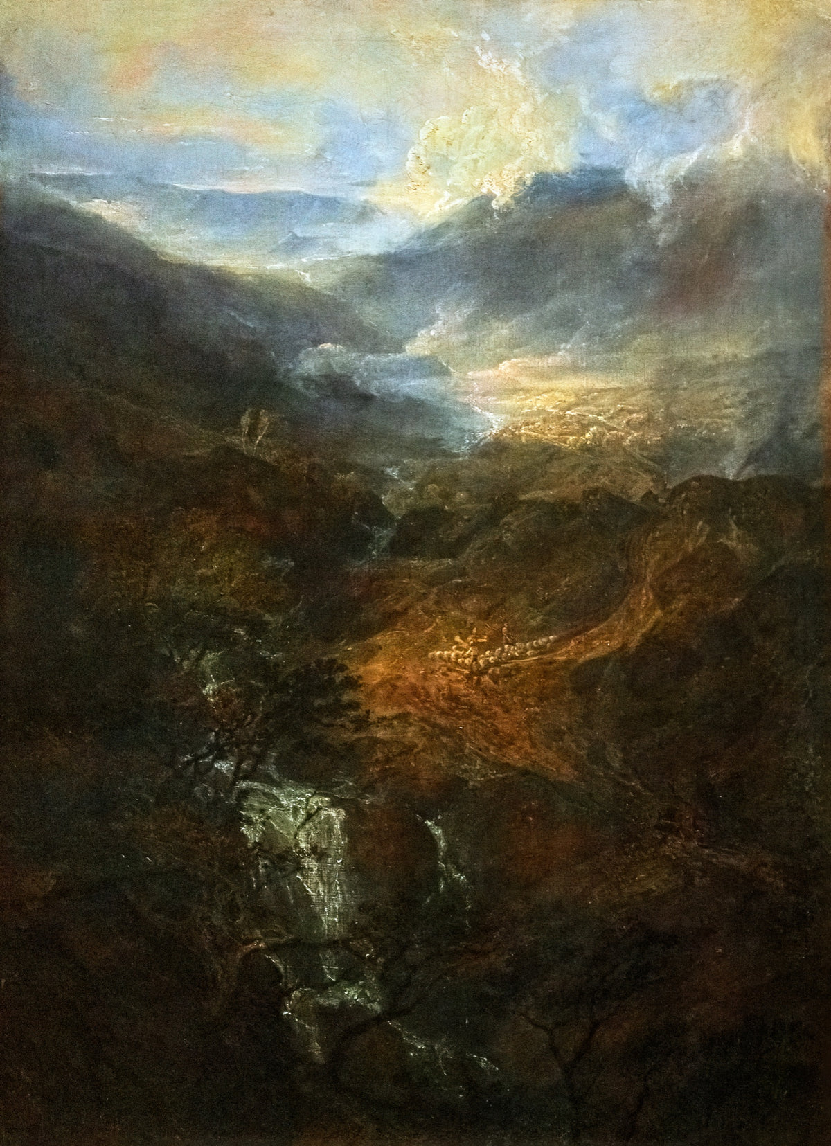 Morning amongst the Coniston Fells by J. M. W. Turner: mist rising from a dark mountain valley, sunlight breaking through