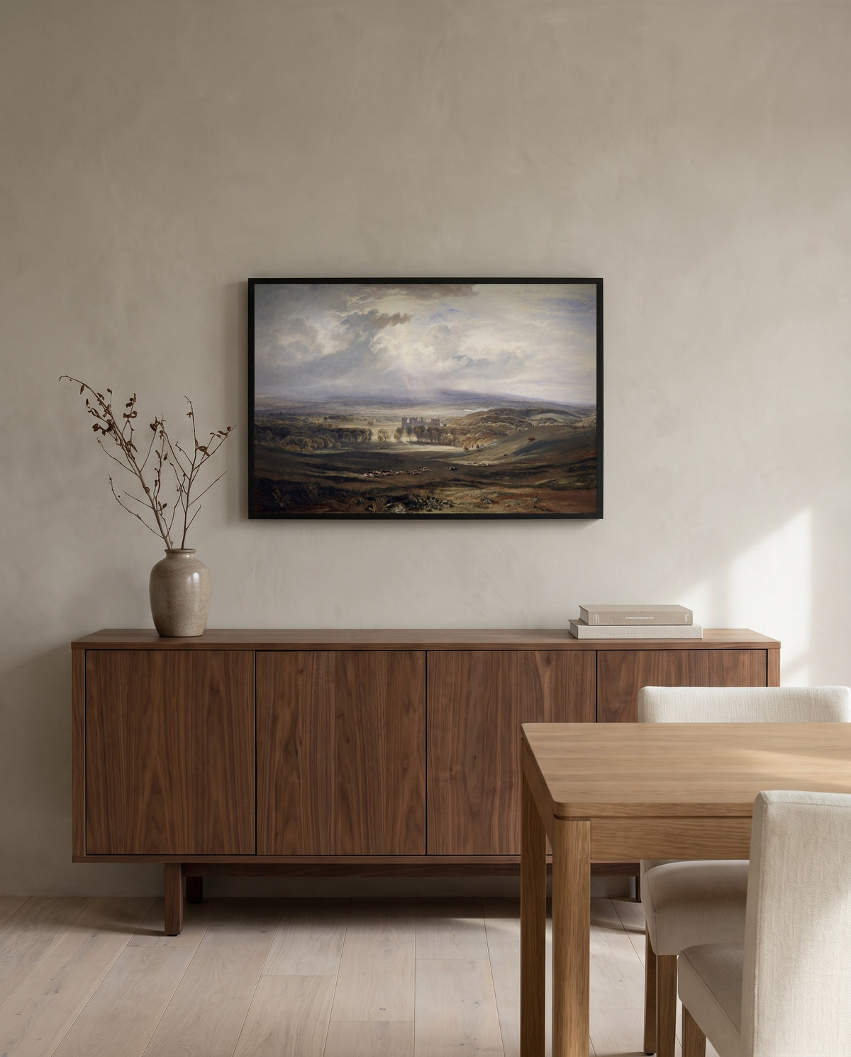 Raby Castle by J. M. W. Turner in a black frame above a walnut sideboard in a dining room
