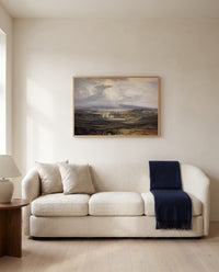 Raby Castle by J. M. W. Turner framed in natural oak above a cream sofa in a warm living room