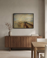 Rain, Steam and Speed by J. M. W. Turner in a black frame above a walnut sideboard in a dining room
