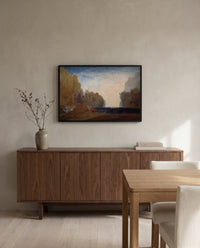 Rocky Bay by J. M. W. Turner in a black frame above a walnut sideboard in a dining room