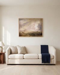 Seascape with Buoy by J. M. W. Turner framed in natural oak above a cream sofa in a warm living room