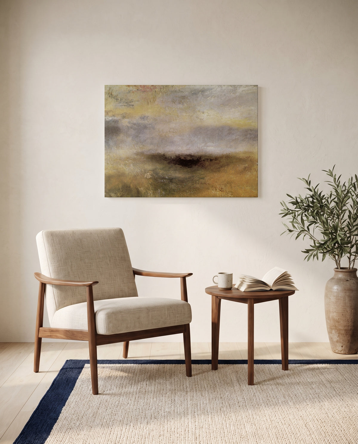 Storm Coming On by J. M. W. Turner as a stretched canvas above a linen lounge chair in a reading corner