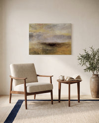 Storm Coming On by J. M. W. Turner as a stretched canvas above a linen lounge chair in a reading corner