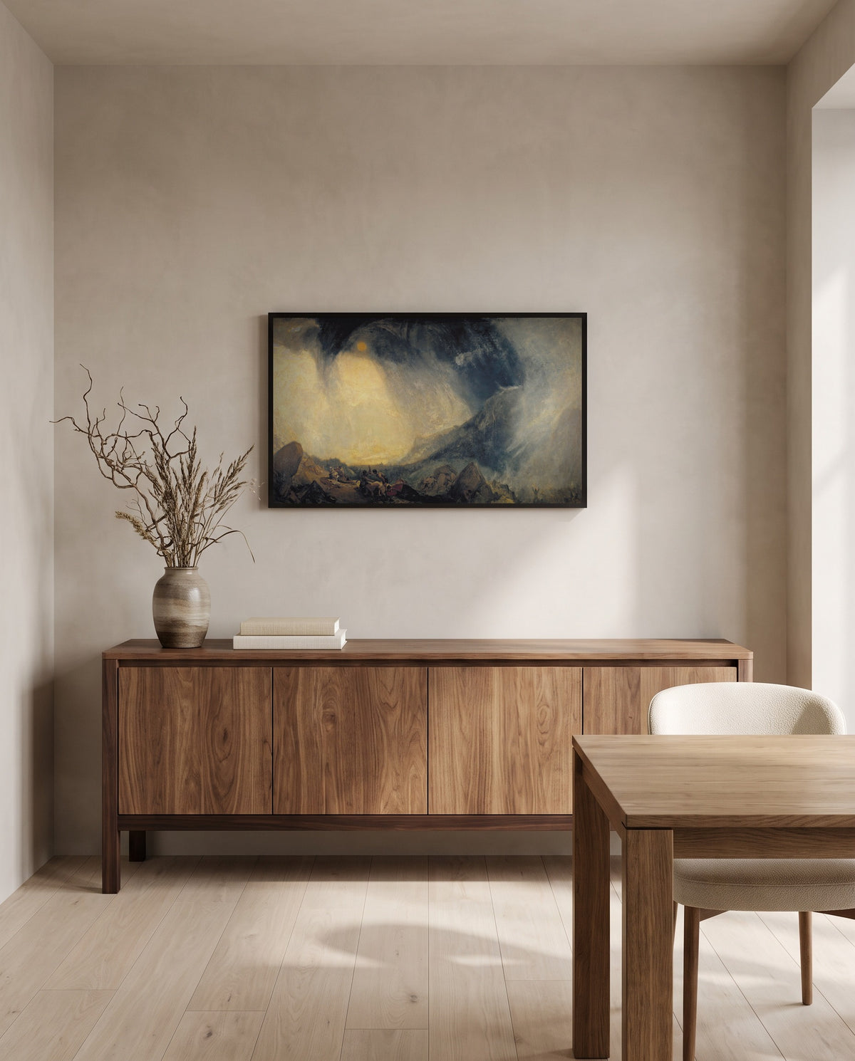 Snow Storm: Hannibal by J. M. W. Turner in a black frame in a dining room