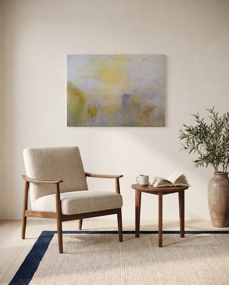 Boat between Headlands by J. M. W. Turner as a stretched canvas above a linen lounge chair in a reading corner