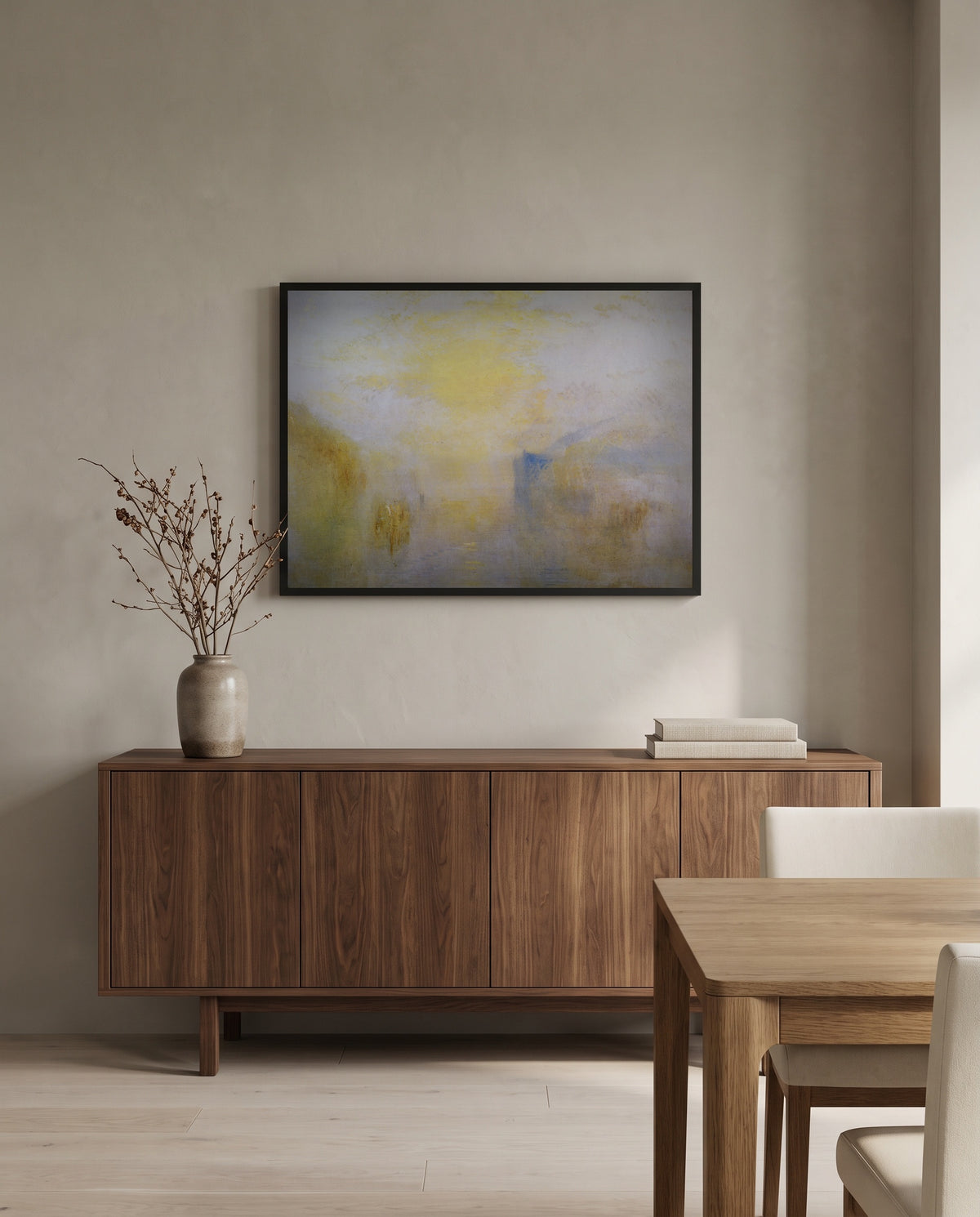Boat between Headlands by J. M. W. Turner in a black frame above a walnut sideboard in a dining room