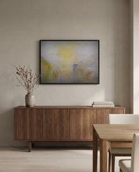 Boat between Headlands by J. M. W. Turner in a black frame above a walnut sideboard in a dining room