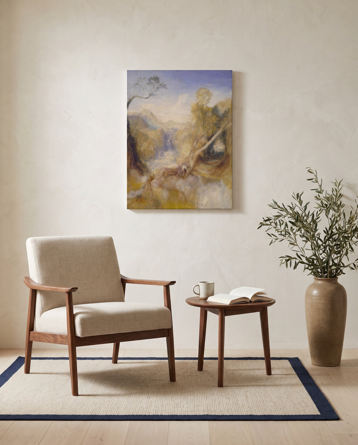 The Death of Actaeon by J. M. W. Turner as a stretched canvas above a linen lounge chair in a reading corner