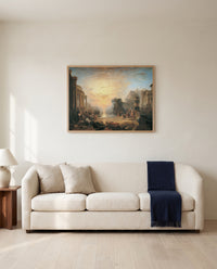 Decline of Carthage by J. M. W. Turner framed in natural oak above a cream sofa in a warm living room