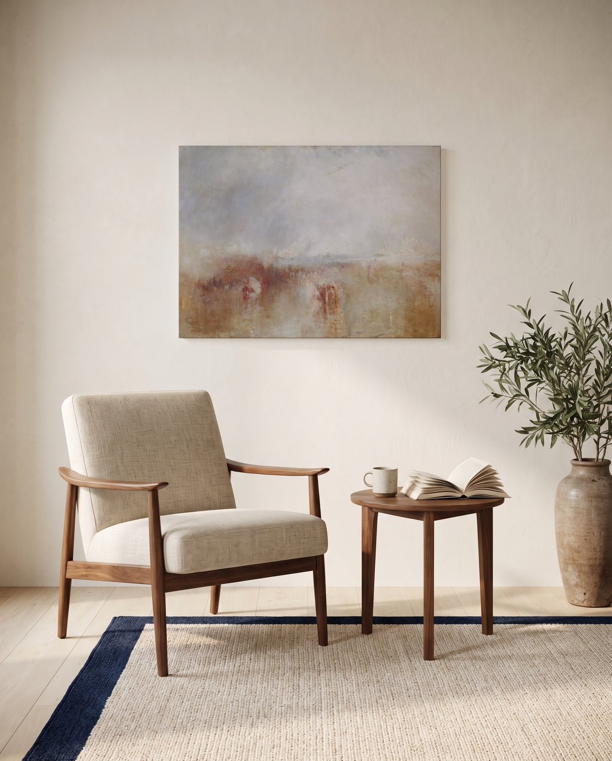 Louis-Philippe at Gosport by J. M. W. Turner as a stretched canvas above a linen lounge chair in a reading corner