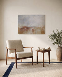 Louis-Philippe at Gosport by J. M. W. Turner as a stretched canvas above a linen lounge chair in a reading corner