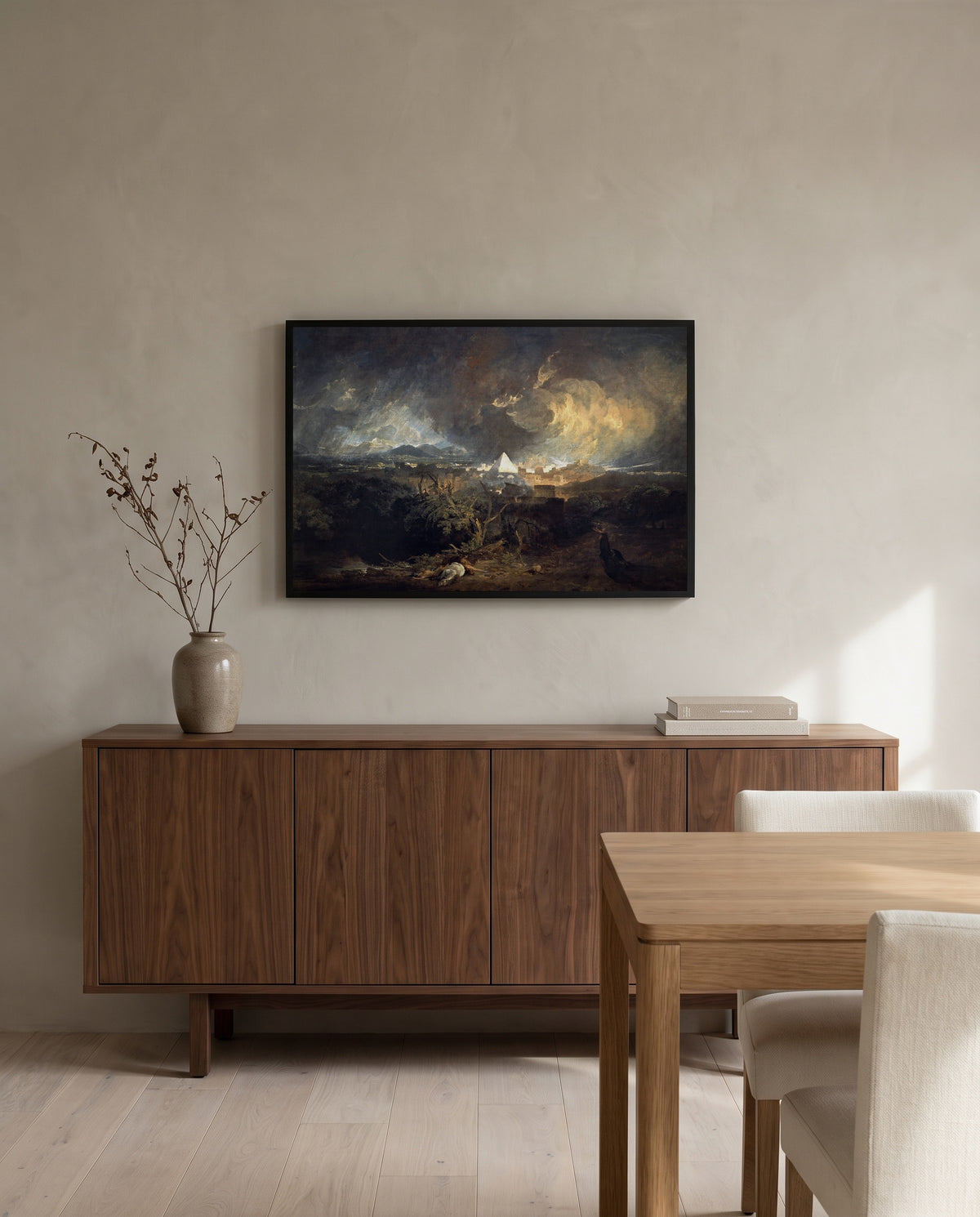 The Fifth Plague of Egypt by J. M. W. Turner in a black frame above a walnut sideboard in a dining room