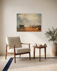Fish Market at Hastings by J. M. W. Turner as a stretched canvas above a linen lounge chair in a reading corner