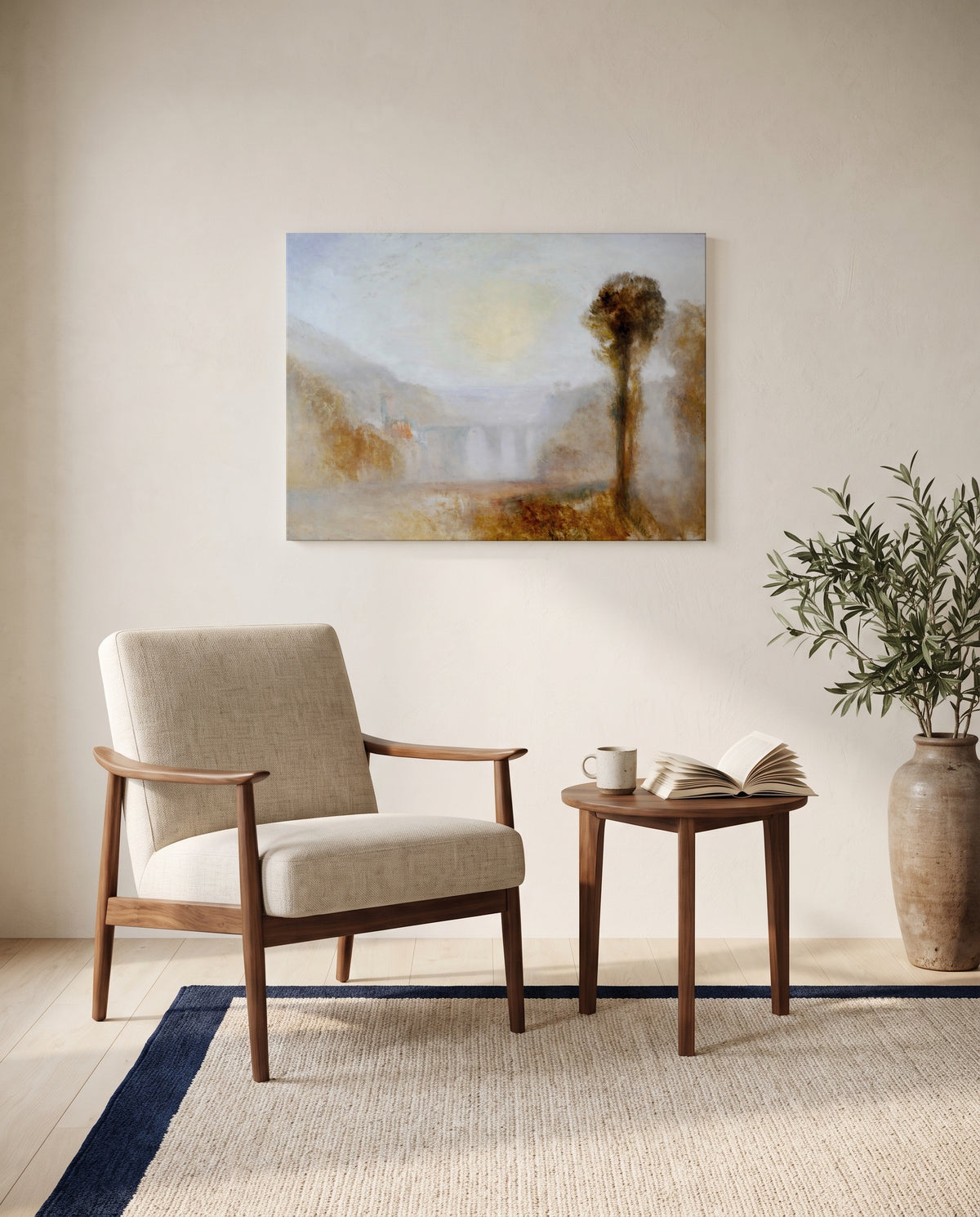 Ponte delle Torri, Spoleto by J. M. W. Turner as a stretched canvas above a linen lounge chair in a reading corner