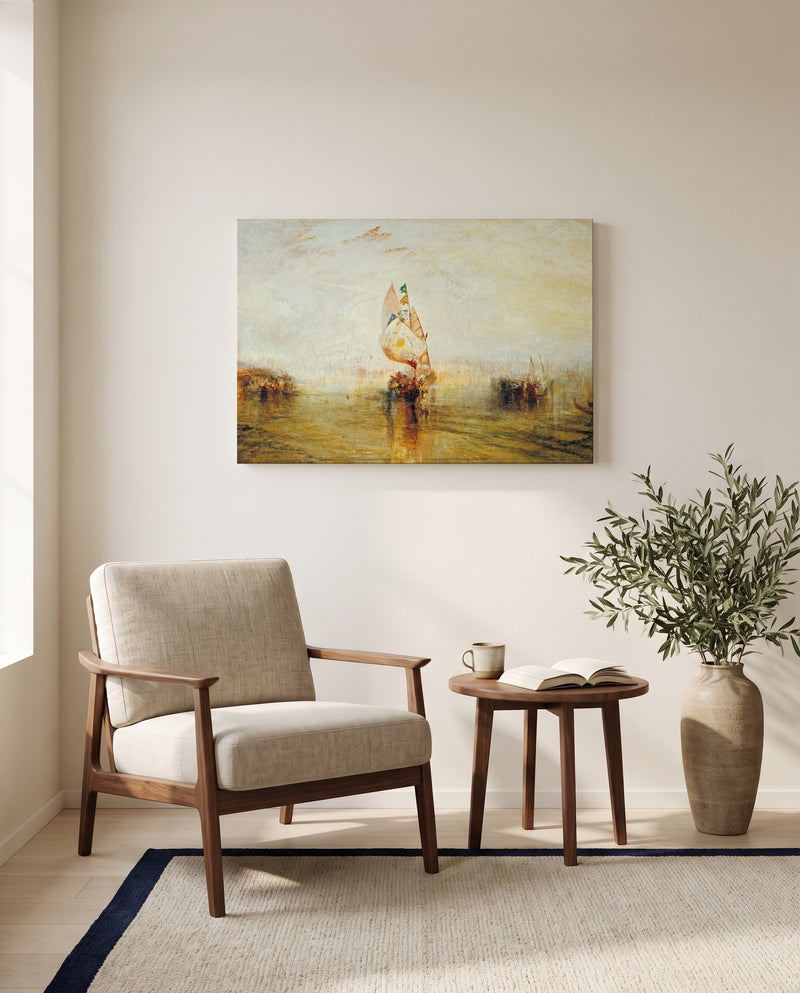 The Sun of Venice by J. M. W. Turner as a stretched canvas above a linen lounge chair in a reading corner