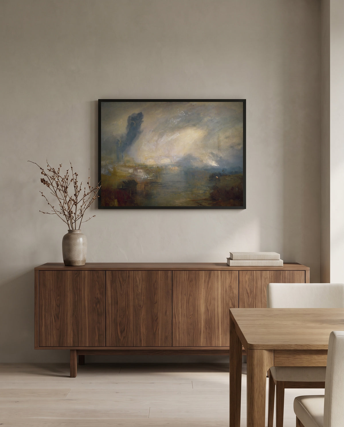 Thames above Waterloo Bridge by J. M. W. Turner in a black frame above a walnut sideboard in a dining room