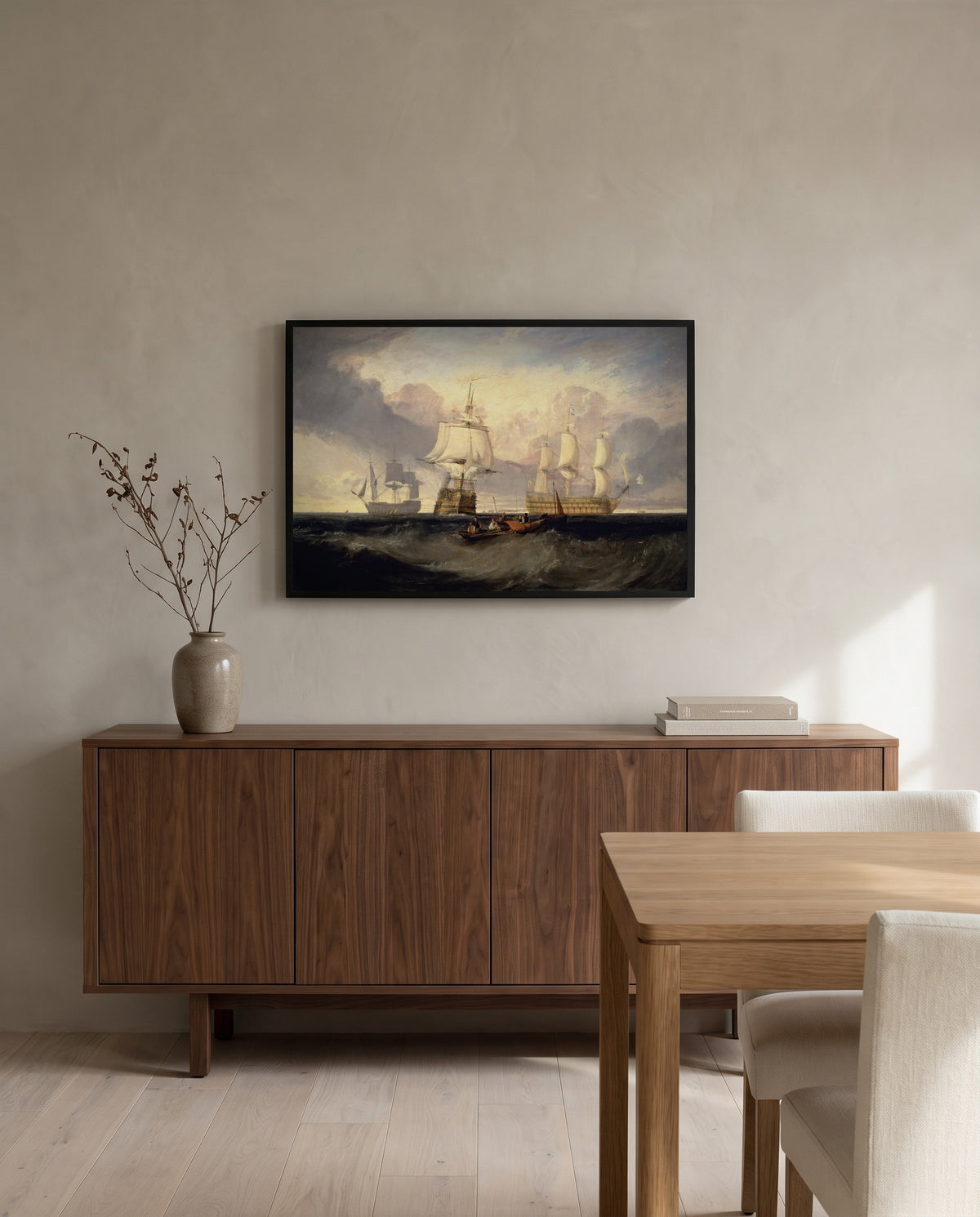 Victory from Trafalgar by J. M. W. Turner in a black frame above a walnut sideboard in a dining room