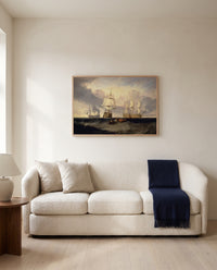 Victory from Trafalgar by J. M. W. Turner framed in natural oak above a cream sofa in a warm living room