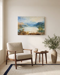 Ullswater by J. M. W. Turner as a stretched canvas above a linen lounge chair in a reading corner