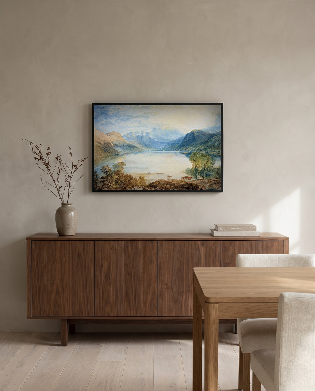 Ullswater by J. M. W. Turner in a black frame above a walnut sideboard in a dining room