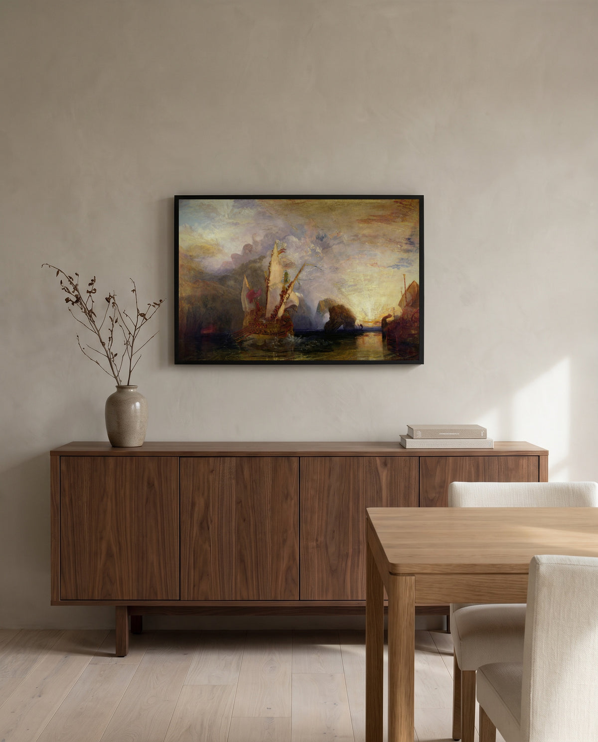 Ulysses Deriding Polyphemus by J. M. W. Turner in a black frame above a walnut sideboard in a dining room