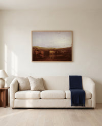 Union of the Thames and Isis by J. M. W. Turner framed in natural oak above a cream sofa in a warm living room