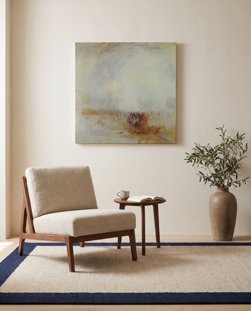 Venetian Scene by J. M. W. Turner as a stretched canvas above a linen lounge chair in a reading corner