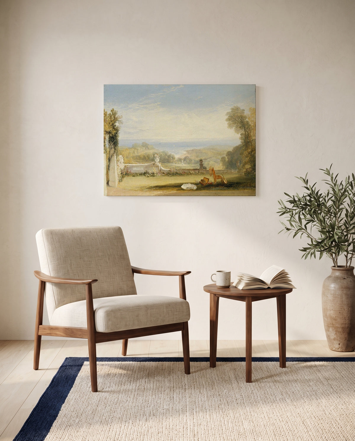 Terrace at Niton by J. M. W. Turner as a stretched canvas above a linen lounge chair in a reading corner