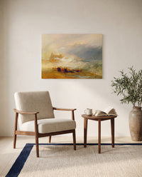 Wreckers, Northumberland by J. M. W. Turner as a stretched canvas above a linen lounge chair in a reading corner